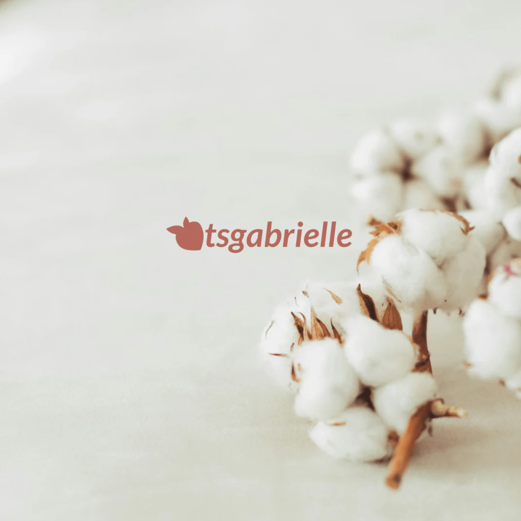 Cotton plant with 'tsgabrielle' logo on a light background